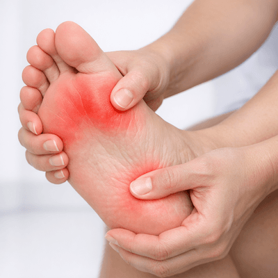 Patient with foot joint pain and discomfort
